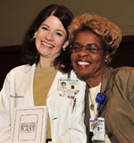 Dr. Stephanie Coulter receives award from Carolyn Montgomery, RN.