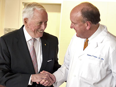 Dr Denton A. Cooley is congratulated by Dr Charles Fraser, Jr. at May 3rd ceremony