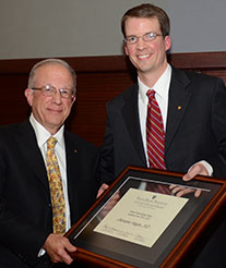 Dr. Christopher Higgins (r) named Tauber Outstanding Fellow Dr. Christopher Higgins (r) named Tauber Outstanding Fellow
