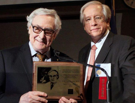 Dr. Joseph Coselli, right, presents Dr. Bud Frazier with Baylor College of Medicine's Lifetime Achievement Award.