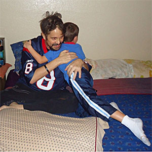 SynCardia Total Artificial Heart recipient Jeremiah Kliesing hugs his 6-year-old son John SynCardia Total Artificial Heart recipient Jeremiah Kliesing hugs his 6-year-old son John