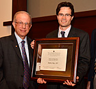 Dr. Stephen May (r) receives Tauber Outstanding Fellow distinction.